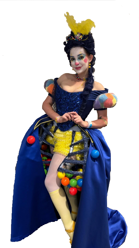 Lochlan, the Ballpit Queen, posing in their gown