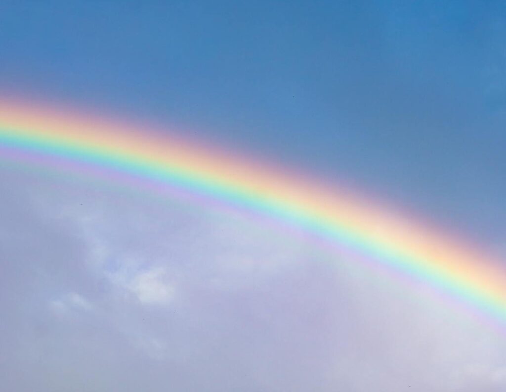 Rainbow over blue sky. Source: Alexandre P. Junior, Pexels