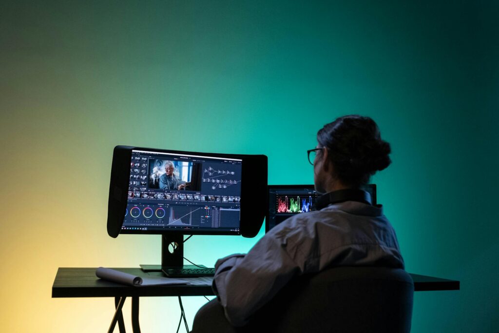 Person video editing at their desk. Source: Ron Lach, Pexels
